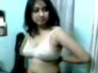 Dp fhg 676 Lovely Indian girl changing her clothes. 
